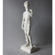 Classical Renaissance male statue with detailed anatomy, standing in contrapposto pose, inspired by old world European sculpture. Different Angle