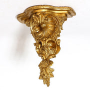 Baroque wall bracket with ornate scrollwork, acanthus leaves, and shell motif in old world European classical style. Side View