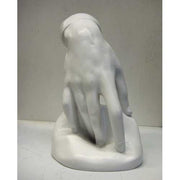 Classical Renaissance-style torso sculpture with detailed musculature and an unfinished, headless form on a smooth base. Side Angle