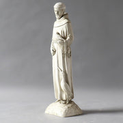 Saintly monk statue in old world European style, holding a bird with an ornate, classical design and a crane at his feet. Additional Angle