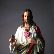 Sacred Heart of Jesus statue in classical Renaissance style, featuring ornate robes and detailed facial expression, standing on a pedestal. Side Angle View