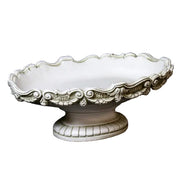 Ornate pedestal bowl with scalloped edge and classical Baroque detailing, featuring intricate scrollwork and old world European design. Side View
