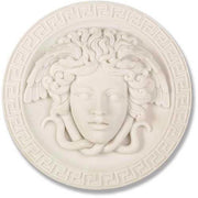 Medusa head relief with flowing serpentine hair, surrounded by a Greek key border in classical old world European style. Side View
