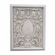 Ornate rectangular wall plaque with classical Baroque detailing, featuring intricate scrollwork and symmetrical floral motifs. Side View