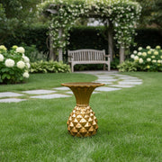Ornate old world European side table with a sculpted pineapple base and scalloped top, featuring classical geometric detailing. Side Angle