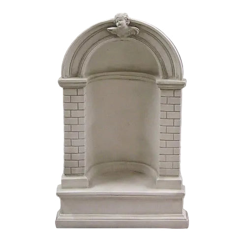 Classical old world European niche wall fountain with arched top, brick detailing, and ornate cherub accent in Baroque style.