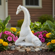 Seated giraffe sculpture with elongated neck and stylized, ornate detailing in a classical old world European style. Side Angle