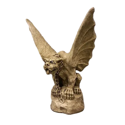 Gothic gargoyle statue with large outstretched wings, crouching posture, and ornate medieval detailing on a pedestal.