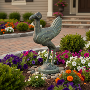 Ornate old world European bird sculpture with classical detailing and stylized feathers on a round pedestal base. Side Angle