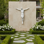 Crucifix with classical Renaissance style, featuring an ornate depiction of Christ with outstretched arms and detailed drapery. Different Angle