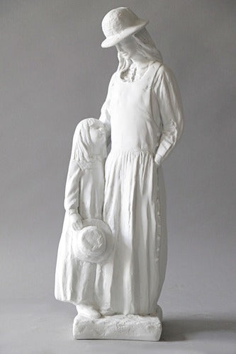 Mother and child statue in old world European style, featuring classical draped clothing and gentle, ornate detailing. Side Angle
