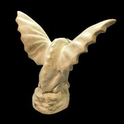 Gothic gargoyle statue with outstretched wings, fierce expression, and ornate chain detail in medieval European style. Side Angle
