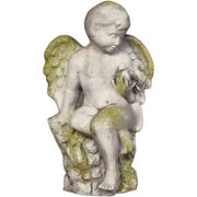 Cherub statue in classical old world European style, seated with wings and ornate detailing, evoking Renaissance garden art.
