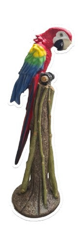 Macaw parrot perched on an ornate, old world European style tree stump with classical detailing and naturalistic features