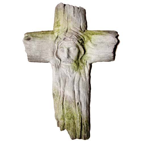 Weathered Gothic cross with carved relief of Christ’s face, featuring ornate old world European detailing and medieval styling.
