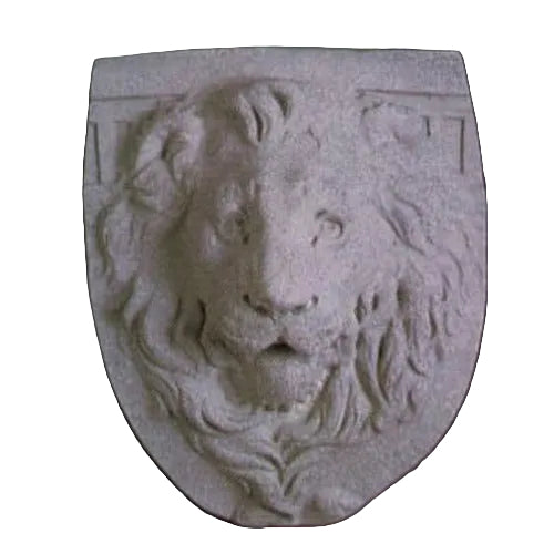 Lion head relief on a shield-shaped plaque, featuring ornate, old world European classical detailing and expressive facial features.
