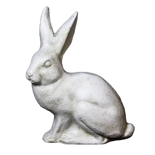 Sitting rabbit statue with elongated ears, featuring classical old world European sculptural details and subtle ornate accents. Side View