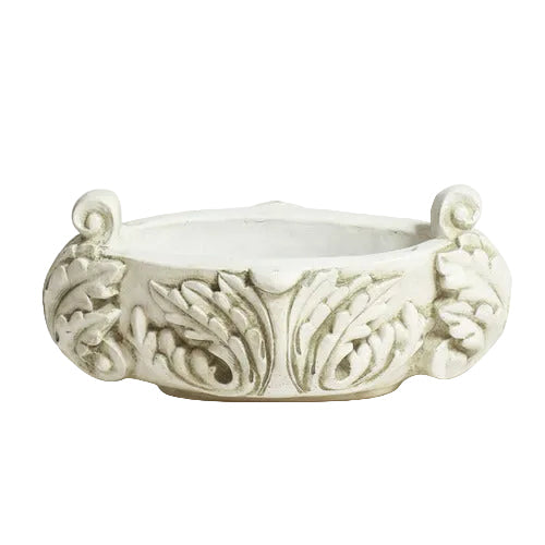 Ornate round bowl with classical old world European scrollwork and leaf motifs, featuring Baroque-inspired decorative handles. Side View