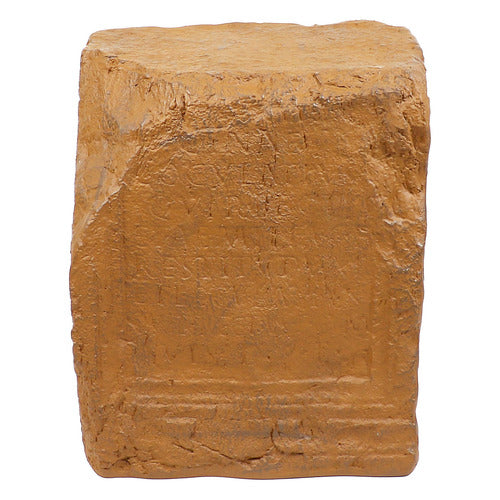 Ancient rectangular stone block with weathered inscriptions, featuring classical old world European architectural detailing. Side View