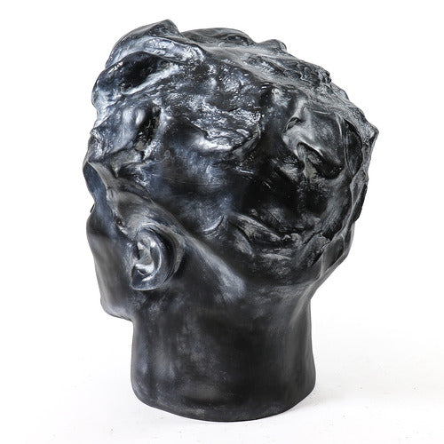 Classical Greco-Roman style male bust with strong features and wavy hair, evoking Renaissance and old world European artistry. Side Angle