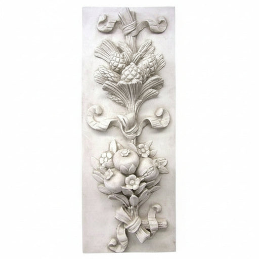 Ornate old world European wall plaque with classical floral and fruit relief, featuring scrollwork and Baroque detailing.