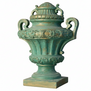 Ornate old world European urn with classical Baroque detailing, fluted body, scroll handles, and decorative lid on pedestal base