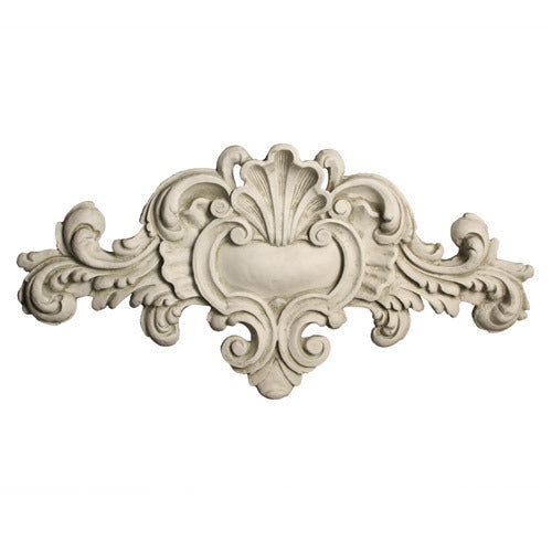 Ornate Baroque-style architectural applique with symmetrical scrollwork, acanthus leaves, and classical old world European detailing.