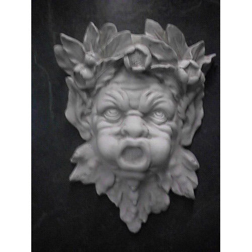 Grotesque face wall decor in classical European style, featuring ornate leaf and berry details, inspired by old world architectural motifs.