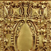Ornate rectangular plaque with intricate Baroque scrollwork and classical old world European detailing in raised relief. Different Angle