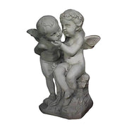 Cherub statue in old world European style with one cherub seated and another leaning in, featuring ornate Baroque detailing.