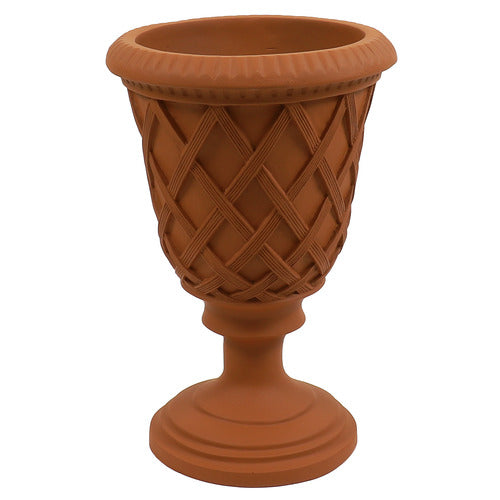 Ornate old world European urn planter with classical lattice pattern and fluted pedestal base, inspired by Renaissance garden design.