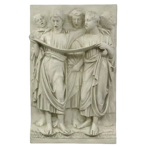 Classical relief sculpture featuring four robed figures in flowing garments, evoking Renaissance and old world European artistry.