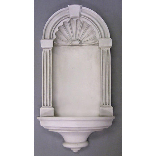 Wall-mounted niche shelf with classical old world European design, fluted columns, arched top, and ornate shell motif.