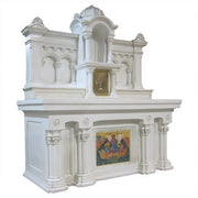 Classical altar table with ornate fluted columns, round medallions, and Renaissance-inspired architectural detailing. Side Angle