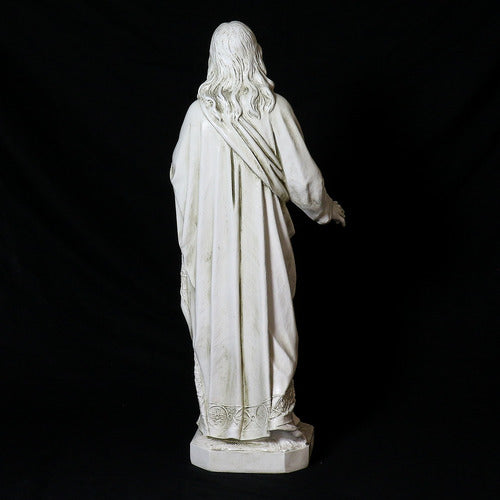 Jesus statue in classical Renaissance style, featuring ornate drapery and detailed facial features, holding a globe in one hand. Additional Angle