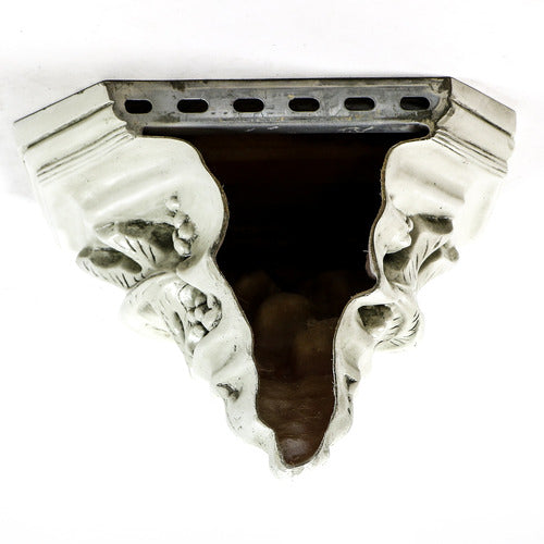 Ornate wall shelf with classical old world European design, featuring intricate acanthus leaf and scrollwork in Baroque style. Different Angle