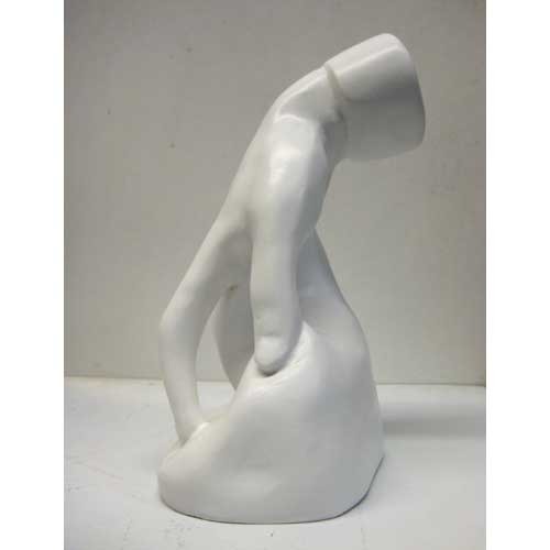 Classical Renaissance-style torso sculpture with detailed musculature and an unfinished, headless form on a smooth base. Different Angle