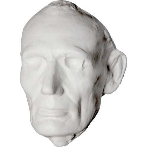 Classical sculpted head with closed eyes and defined features, evoking old world European and Renaissance artistry.