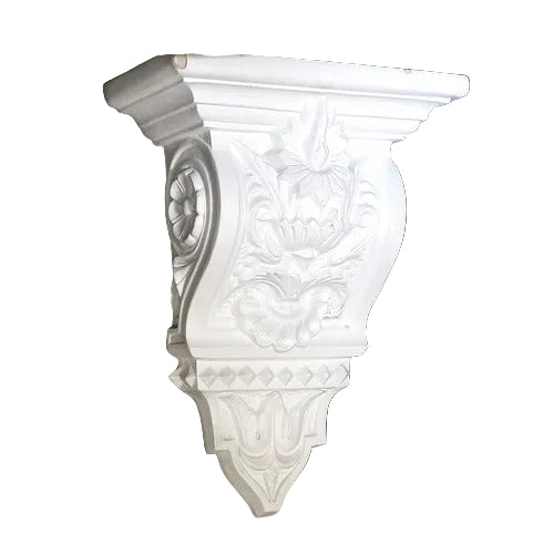Ornate classical wall corbel with intricate Baroque floral carvings and old world European architectural detailing. Side View