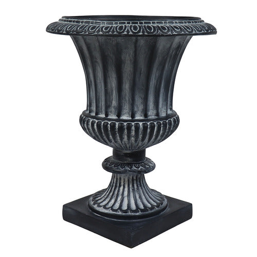 Ornate classical urn planter with fluted body, decorative rim, and pedestal base in old world European style. Side Angle