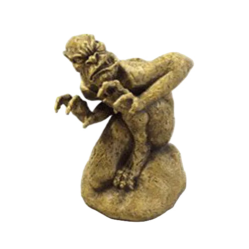 Grotesque gargoyle statue with hunched posture and exaggerated features in medieval Gothic style, perched on a rounded base.