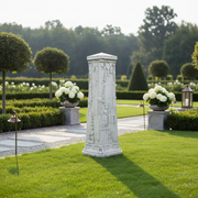 Ornate classical pedestal with old world European and Egyptian-inspired reliefs, featuring intricate geometric and animal motifs. Side Angle