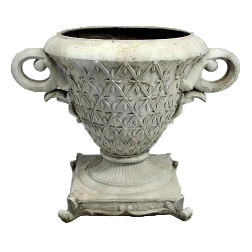 Ornate old world European urn with classical lattice pattern, Baroque scroll handles, and pedestal base with decorative feet.