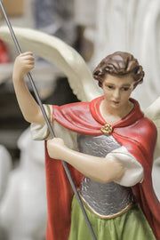 Archangel with flowing cape and ornate armor in classical style, standing over a dragon, holding a spear in dramatic pose. Different Angle