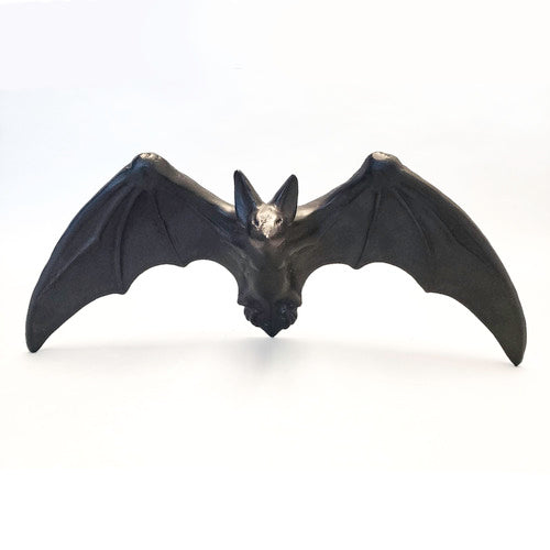 Bat wall decor with outstretched wings, featuring Gothic and medieval-inspired ornate detailing and dramatic silhouette. Side View