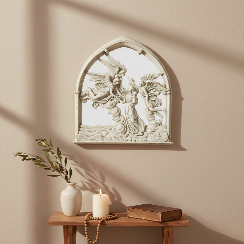 Gothic-style ornate wall plaque featuring angels and a robed figure in high relief within a pointed arch frame. Side Angle