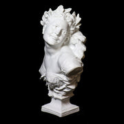 Bust of a smiling woman with laurel wreath, draped garment, and ornate detailing in classical Baroque style. Different Angle
