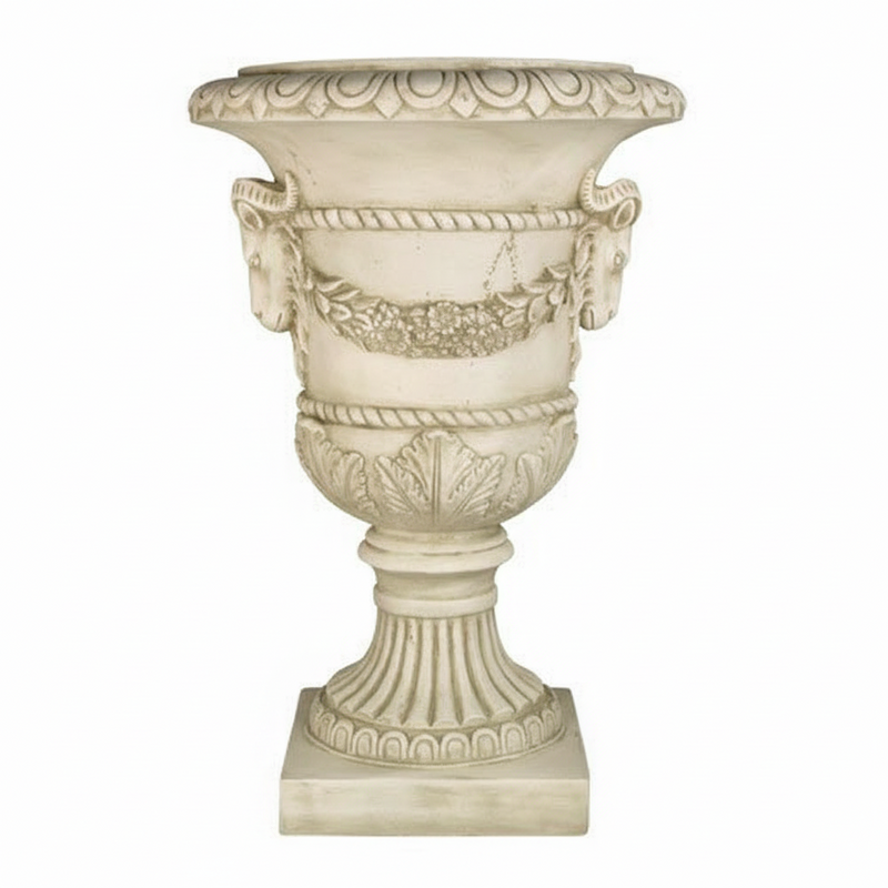 Ornate classical urn with ram head accents, laurel garland, and fluted pedestal in old world European Baroque style. Side View