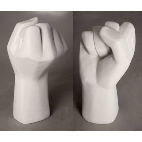 Sculpted fist with geometric, classical lines and minimalist old world European influence, shown from two angles.