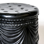 Ornate cylindrical stool with classical draped swag detailing and tassels, inspired by old world European and Baroque design elements. Different Angle